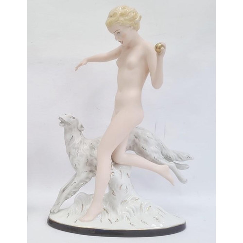 32 - Large Royal Dux Art Deco-style tinted bisque and glazed figure of female nude throwing a ball for he... 