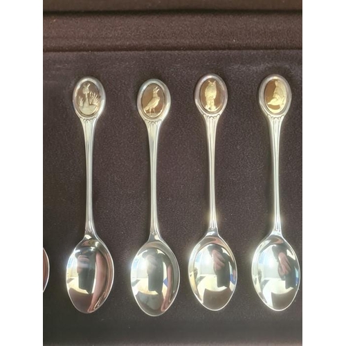 431 - Set of 12 silver spoons from the RSPB Spoon Collection, each spoon with a silver-gilt finial depicti... 