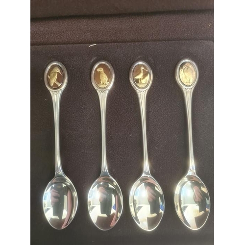 431 - Set of 12 silver spoons from the RSPB Spoon Collection, each spoon with a silver-gilt finial depicti... 