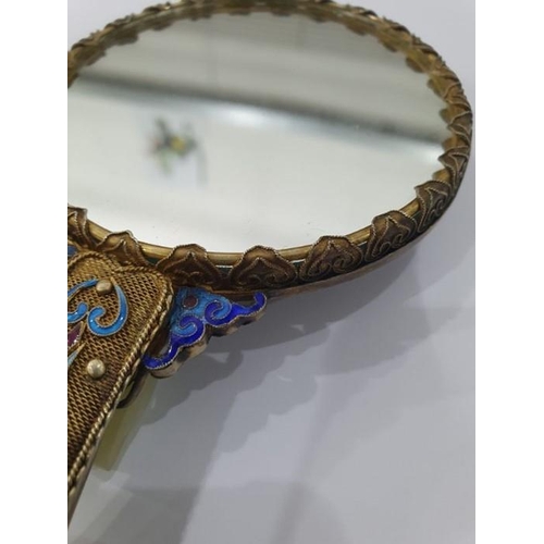 472 - Chinese gilt metal hand mirror, the handle and mirror back each decorated with blue enamel cloisonne... 