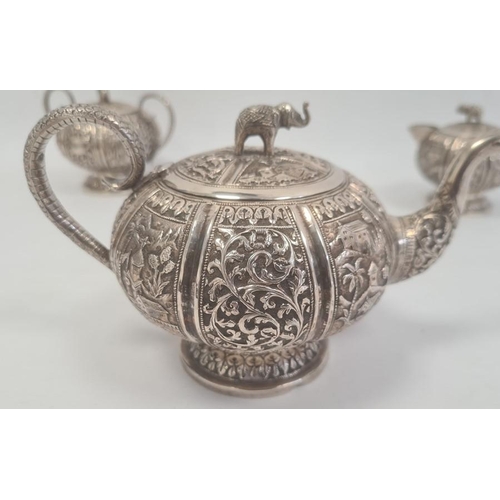 493 - Early 20th century Anglo Indian three-piece tea set comprising teapot, two-handled sugar bowl and mi... 