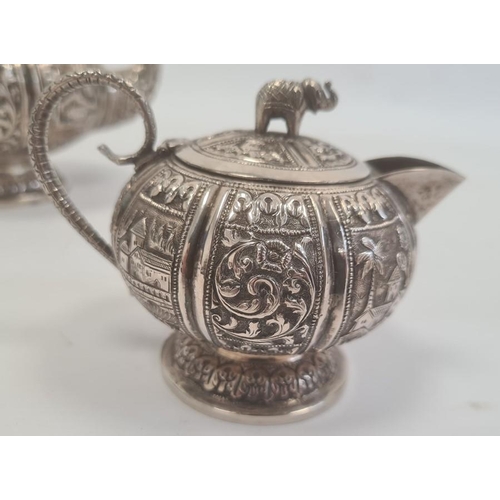 493 - Early 20th century Anglo Indian three-piece tea set comprising teapot, two-handled sugar bowl and mi... 