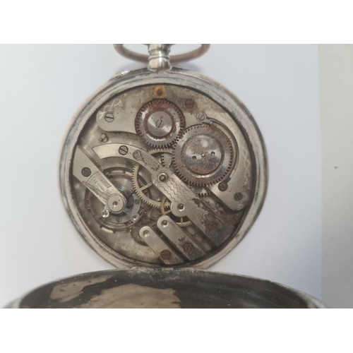 504 - Large continental white metal cased pocket watch, button winding, with subsidiary seconds dial, insc... 