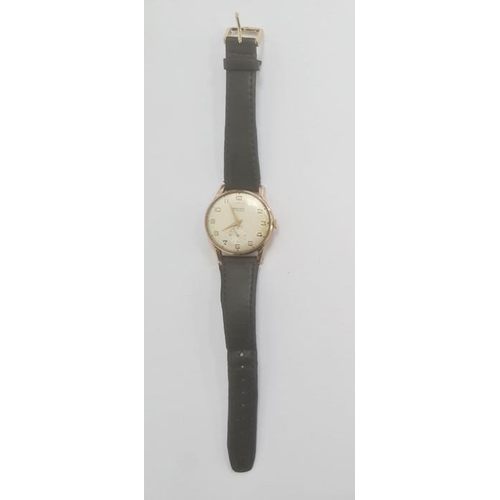 507 - A Baume gold 17 Jewels wristwatch inscribed to reverse 'Dowty Group For 25 Years Service H.R. Moon 1... 