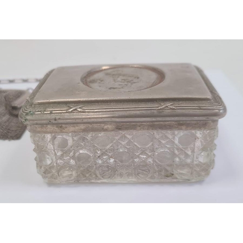 544 - A silver chain purse, a silver coloured metal and glass rectangular trinket box, a silver coloured c... 