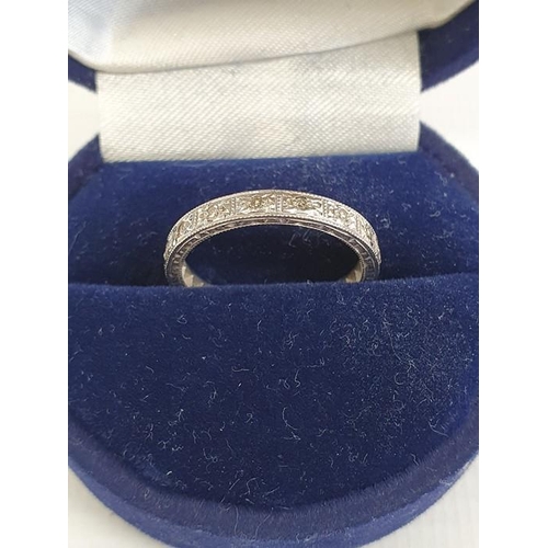 575 - 18ct white gold and diamond eternity ring, 3.2g