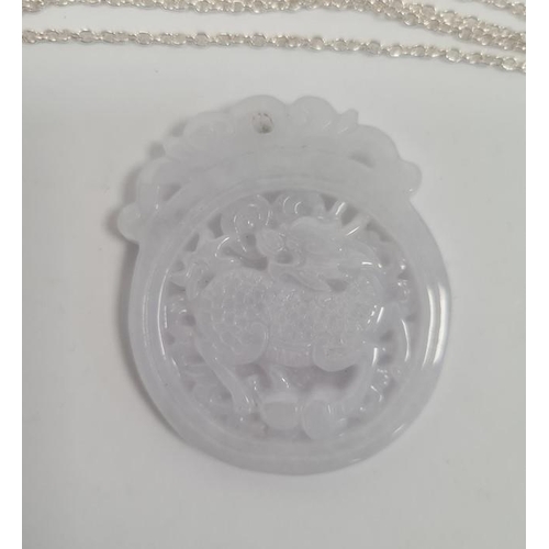 609 - Chinese carved pendant on silver chain