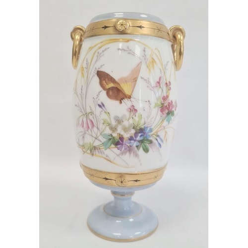 62 - Continental porcelain vase, the barrel-shaped body with gilt border and ring handles, painted with b... 