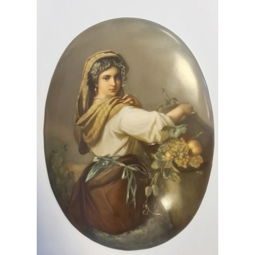 79 - Late 19th century Berlin porcelain plaque, oval and painted with half-length figure of a young woman... 