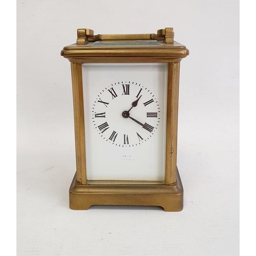 1017 - Brass carriage timepiece in plain case, 15cm high