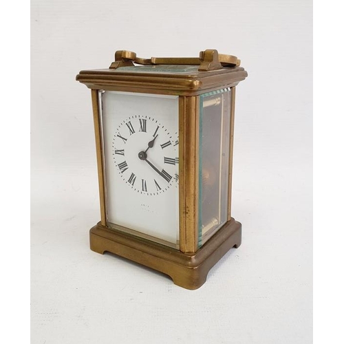 1017 - Brass carriage timepiece in plain case, 15cm high