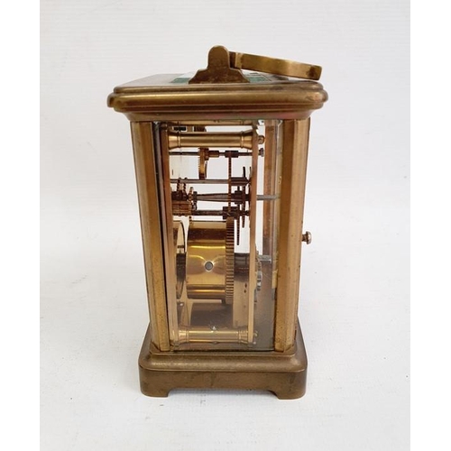 1017 - Brass carriage timepiece in plain case, 15cm high