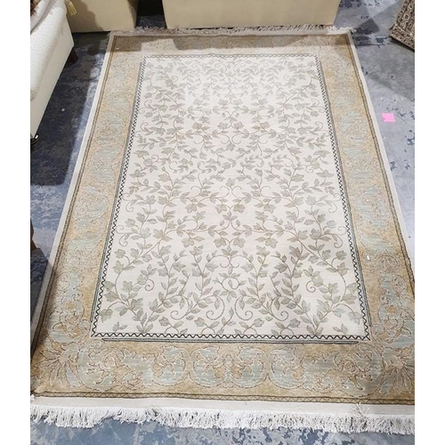 1046 - Modern cream ground rug with leaf decoration, gold borders, 280cm x 202cm