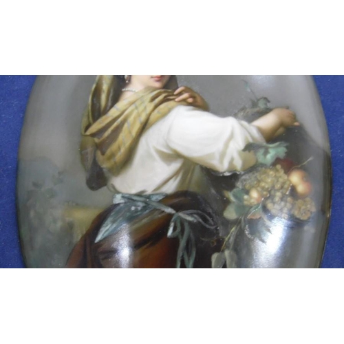 112 - Late 19th century Berlin KPM porcelain plaque, oval and painted with half-length figure of a young w... 