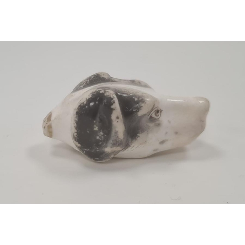 113 - 19th century English porcelain miniature dog’s head whistle, enriched in black and brown enamel, 5.5... 