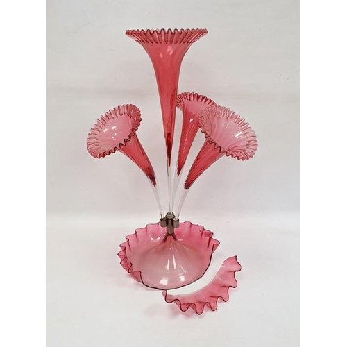 123 - Cranberry and clear glass epergne with central flared trumpet vase, having surround of three smaller... 