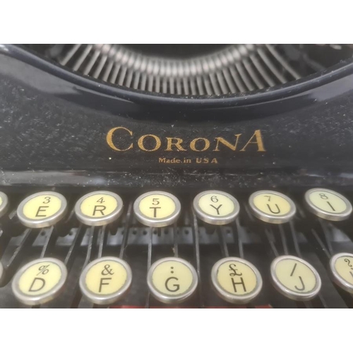 168 - Corona black metal typewriter inscribed L C Smith & Corona Typewriters Ltd, Aldwych, London in carry... 