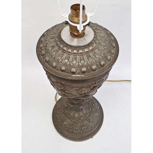 188 - Bronze-effect table lamp, ovoid and tapering with Bacchanalian cherub decoration, on knopped ornate ... 