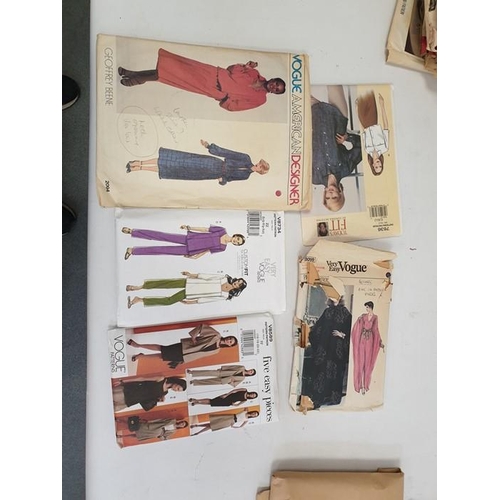 202 - Quantity of Vogue, Butterick and other dress patterns, 1960's and later and a pair Watts patent wood... 