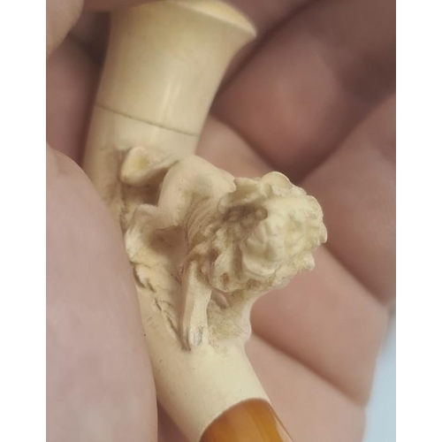 245 - Meerschaum pipe lion decorated, a twig-pattern cheroot holder, cased, a meerschaum and amber Edwardi... 