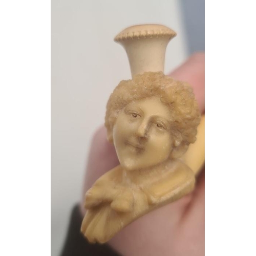 248 - Four meerschaum and amber pipes decorated with Edwardian lady, camel, Middle Eastern gentleman and h... 