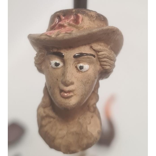 250 - Carved wooden and amber pipe in the form of soldier wearing hat, inscribed 'CIV', possibly Australia... 