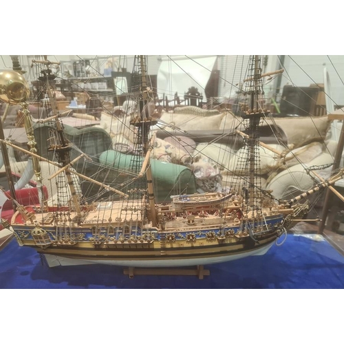 275 - Painted wooden model of The Royal Yacht Caroline 1749, in glazed and stained wood table-top cabinet,... 