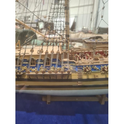 275 - Painted wooden model of The Royal Yacht Caroline 1749, in glazed and stained wood table-top cabinet,... 