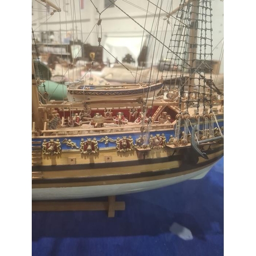 275 - Painted wooden model of The Royal Yacht Caroline 1749, in glazed and stained wood table-top cabinet,... 