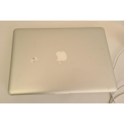 276B - MacBook Pro, model A127A with charging cable