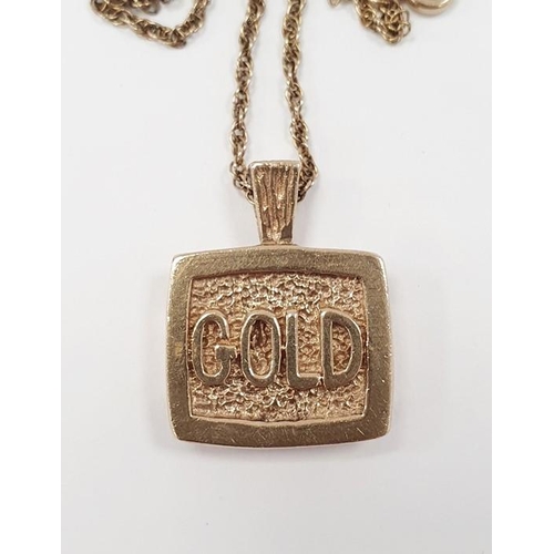 313 - 9ct gold pendant modelled as a half-ounce ingot on a gold coloured chain, total weight approx. 21g