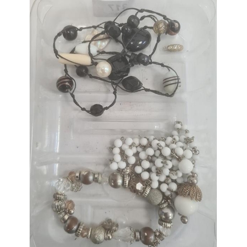 317 - Quantity of costume jewellery including a yellow faceted bead necklace, a snake-link necklace, etc.