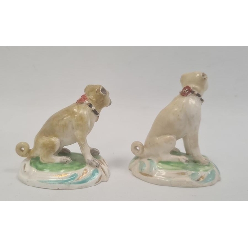 89 - Two various early 19th century Staffordshire china miniature seated pug dogs, the largest 6.5cm high... 