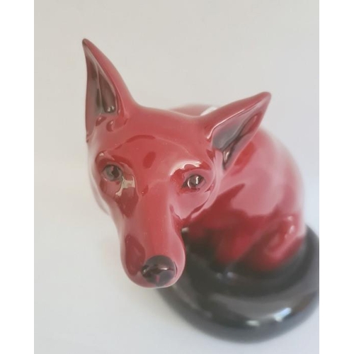 9 - Royal Doulton flambe large seated fox, 24cm approx.