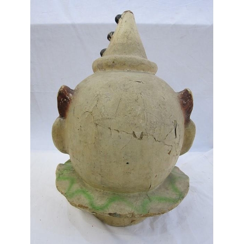 285 - A late 19th/ early 20th century continental painted papier-mache parade/ carnival mask head in the f... 