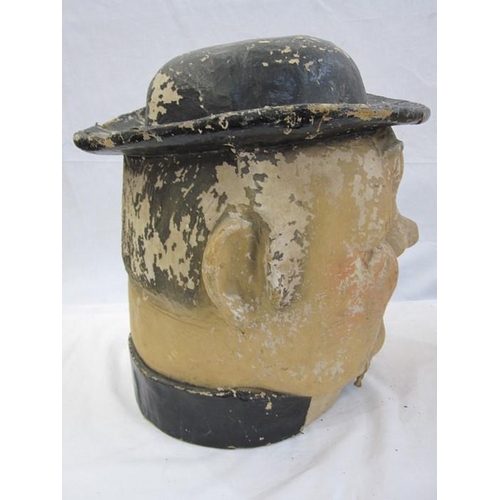 286 - A late 19th/ early 20th century continental painted papier-mache parade/ carnival mask head in the f... 