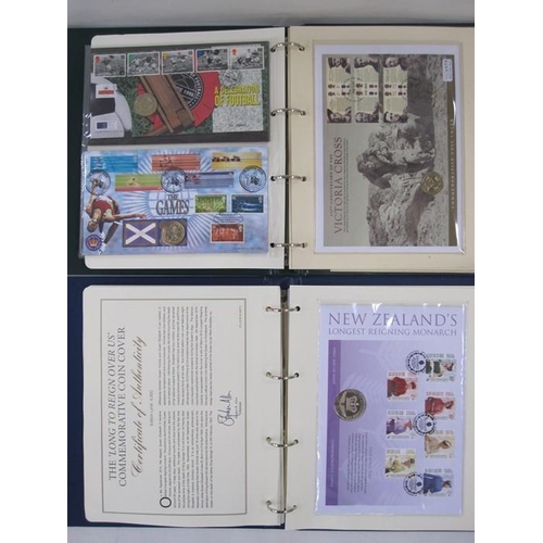 331 - Collection of commemorative coins and stamps, eight folders worth to include complete set of 10p A-Z... 