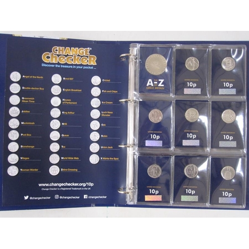 331 - Collection of commemorative coins and stamps, eight folders worth to include complete set of 10p A-Z... 