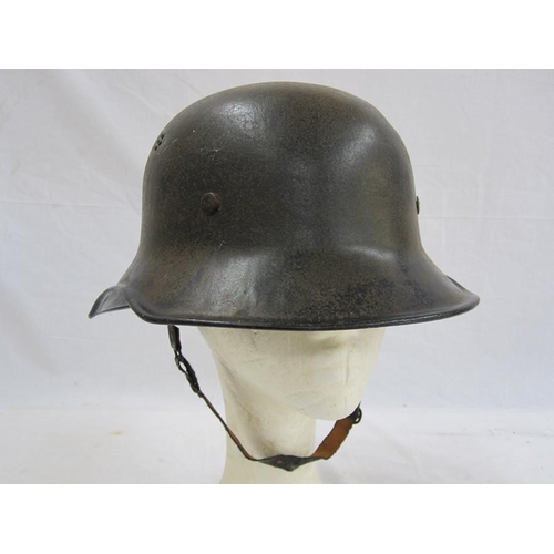 368 - WWII German police helmet with canvas inner and leather chin strap