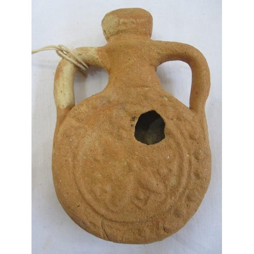 413 - Circa 6-8th AD pilgrim's flask, probably Palestine, 9.5cm

This item is from the collection of Lione... 