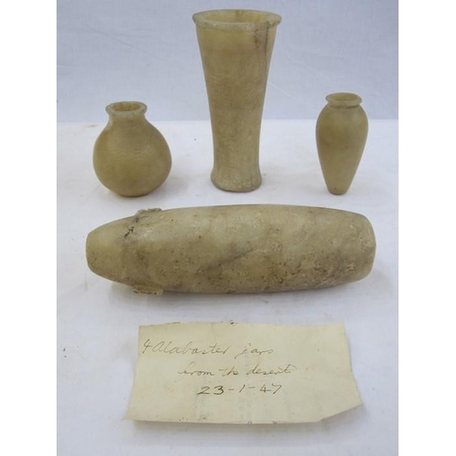 417 - Four ancient Egyptian alabaster vessels with note '4 alabaster jars from the desert 23-1-47' (4)

Th... 