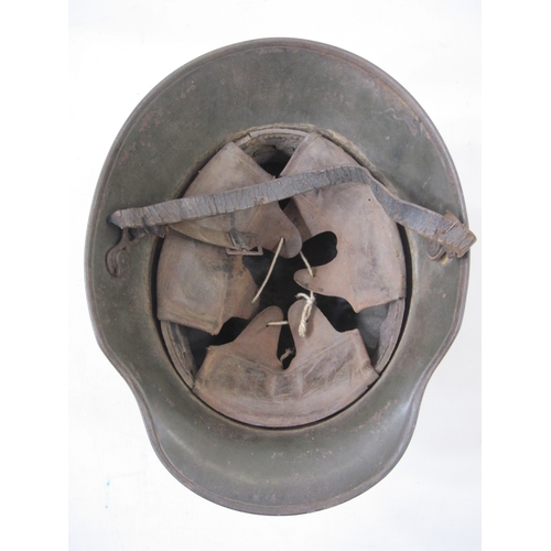 370 - WWI German M16 helmet with leather liner and chin strap