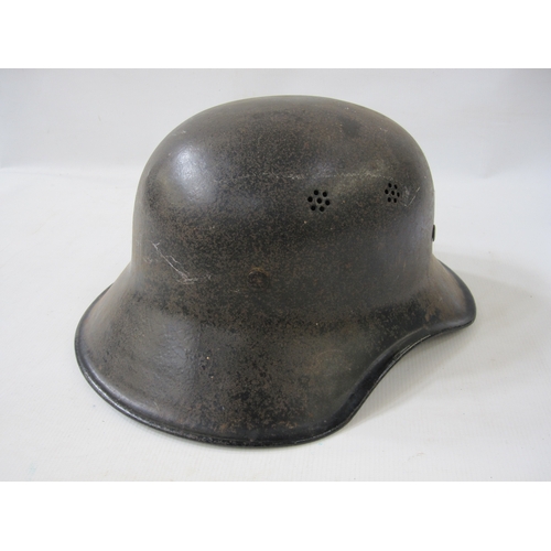 368 - WWII German police helmet with canvas inner and leather chin strap