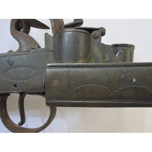 373 - 19th century flintlock table lighter with engraved brass mounts and mahogany scroll handle