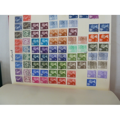 318 - An album of mint decimal stamps presentation pack, an album of miscellaneous Worldwide cut-out sloga... 