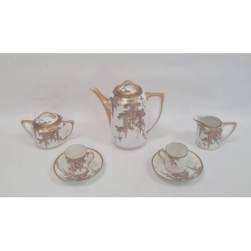 100 - Japanese porcelain tete-a-tete coffee service, wisteria decorated in pink and gold, viz:- coffee pot... 