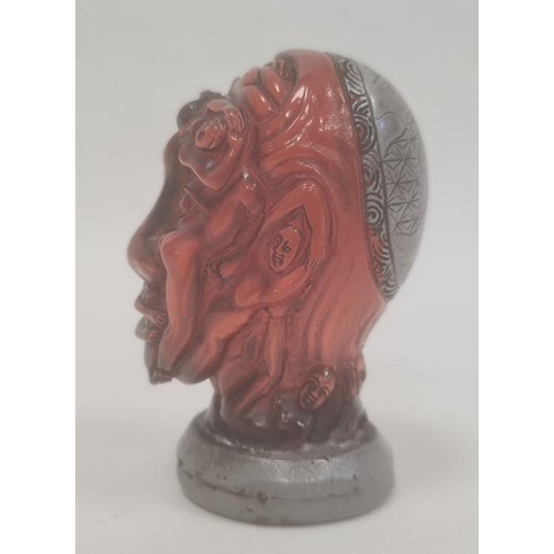 103 - Japanese simulated amber and metal mounted erotic seal in the form of a bust, 7.5cm high