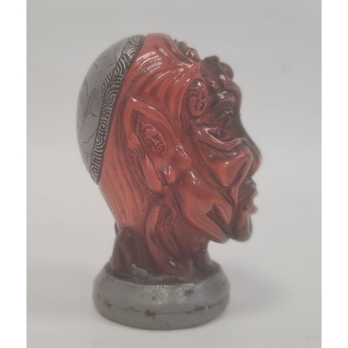 103 - Japanese simulated amber and metal mounted erotic seal in the form of a bust, 7.5cm high