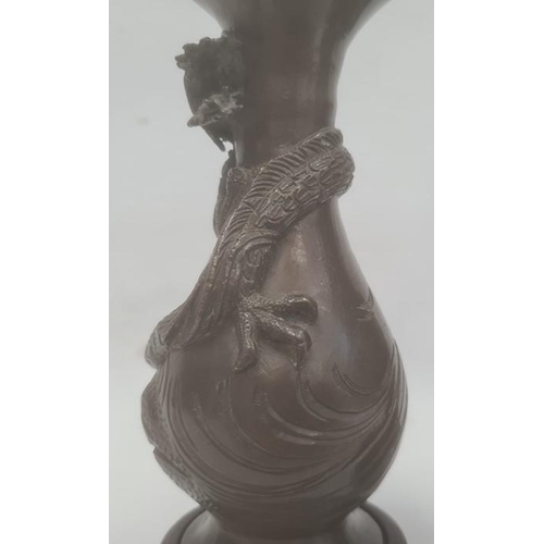 104 - Two Japanese Meiji period bronze vases, the first baluster shaped, 15.5cm high and the second of inv... 