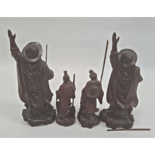 110 - Two various pairs of Japanese carved hardwood figures, the tallest 21cm and a small quantity of carv... 